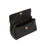 Black handbag with gold accents on a white background