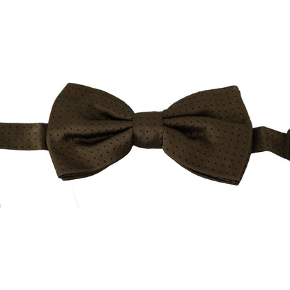 Dolce Gabbana silk bow tie in brown with polka dots, adjustable neck strap, luxury fashion accessory.