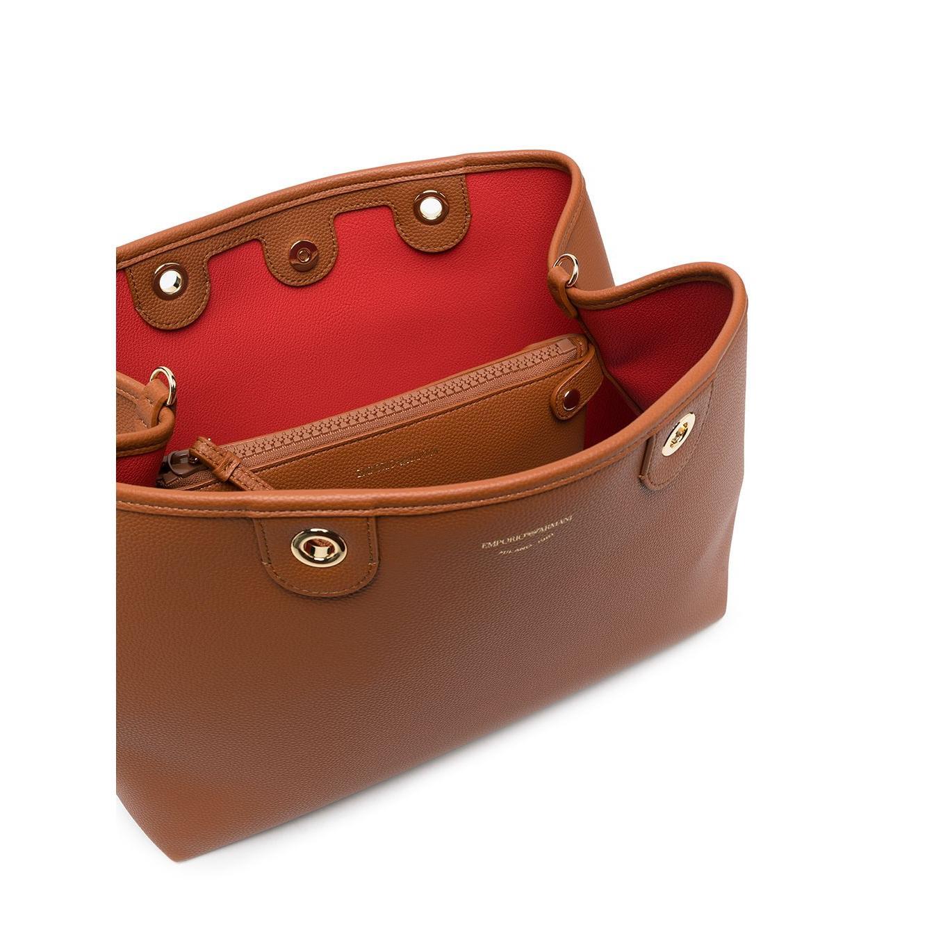 Front view with bag zipped and handles upright.