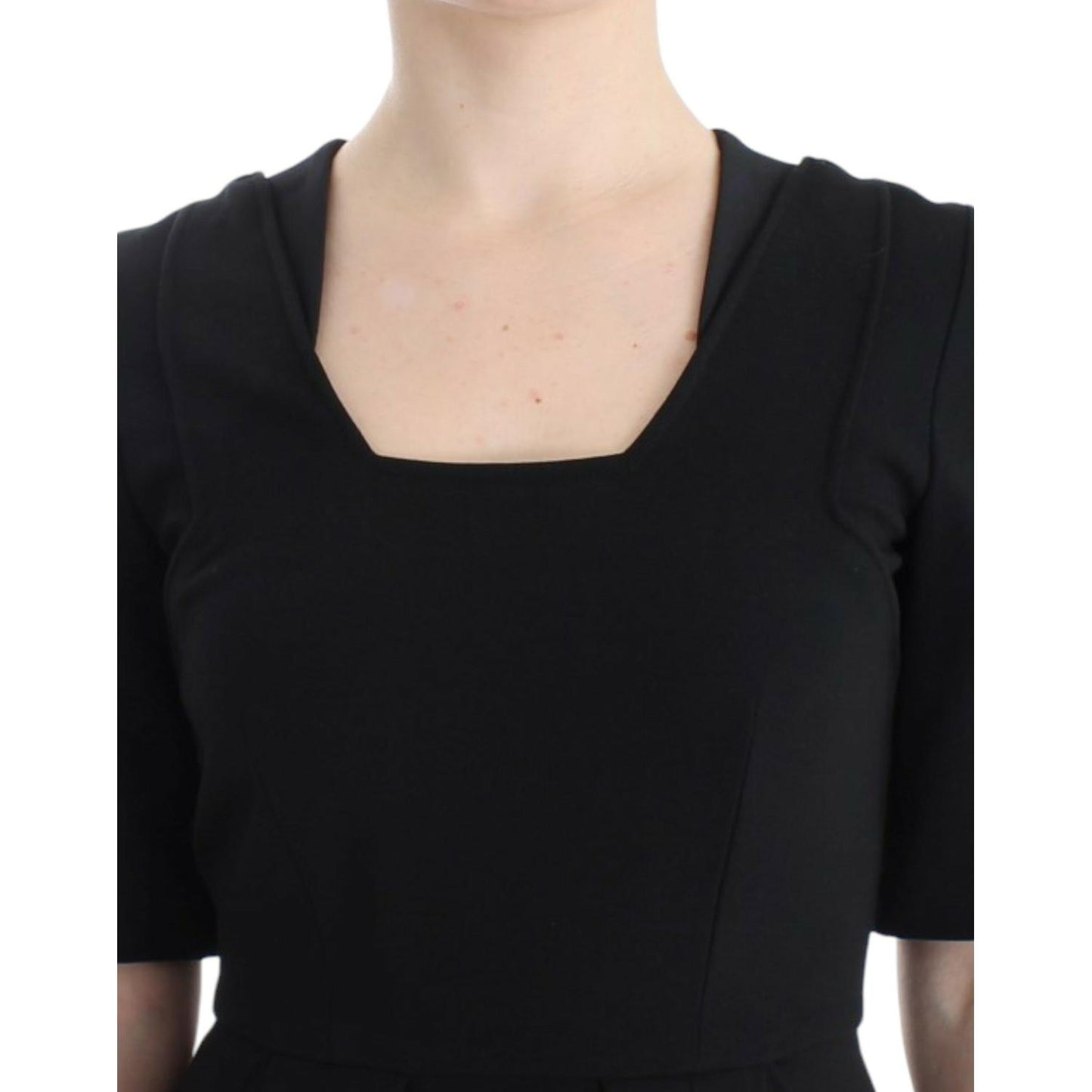 CO|TE Black short sleeve venus dress