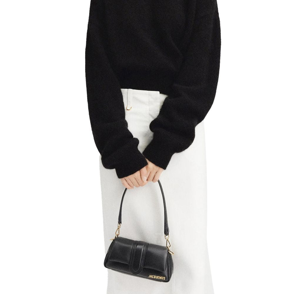 Front view with bag zipped and handles upright.