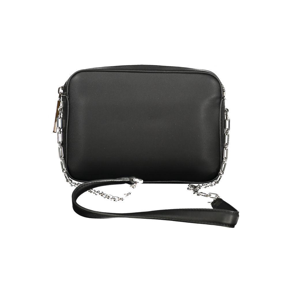 Front view with bag zipped and handles upright.