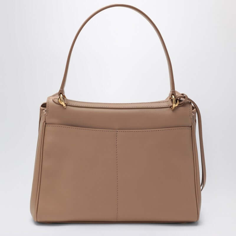 Front view with bag zipped and handles upright.