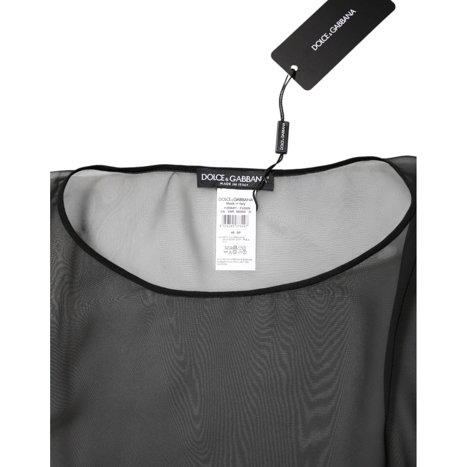 Front view with bag zipped and handles upright.