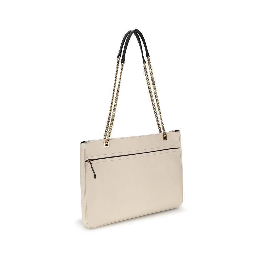 Front view with bag zipped and handles upright.